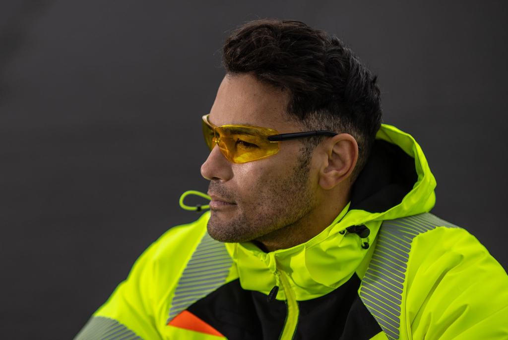 man in googles and jacket uniform