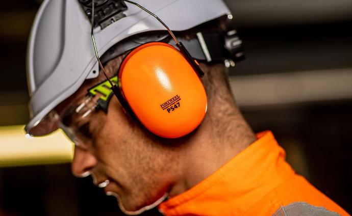 man in ppe goggles glasses hard hat mats shoes
